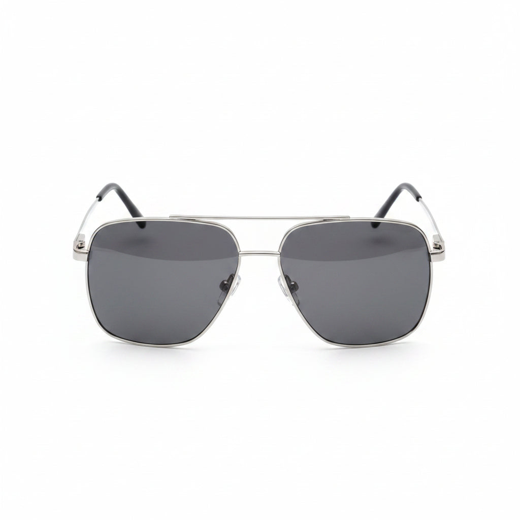 Aviator sunglasses with black lenses on a wooden surface