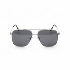 Aviator sunglasses with black lenses on a wooden surface