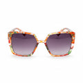 Sunglasses with a colorful frame on a wooden surface