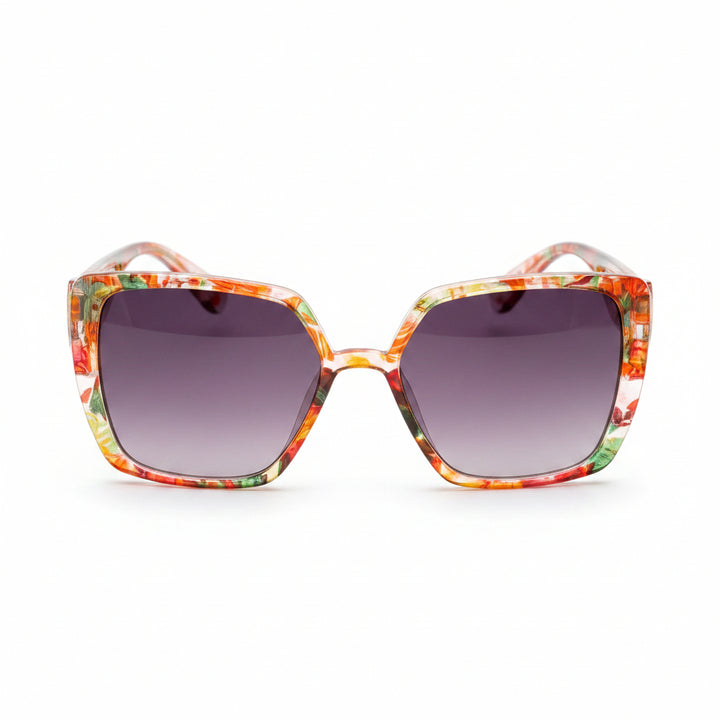 Sunglasses with a colorful frame on a wooden surface