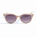 Sunglasses with dark lenses on a wooden surface